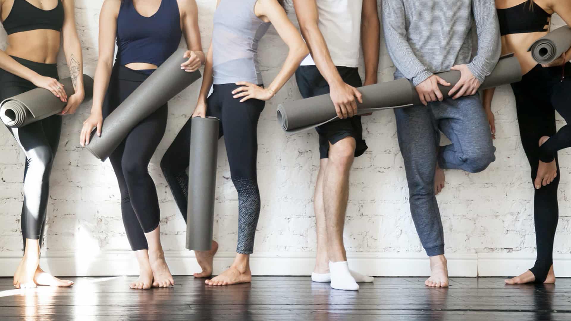 Group Holding Yoga Mats | 3 Ways to Stay Active and Healthy During COVID-19