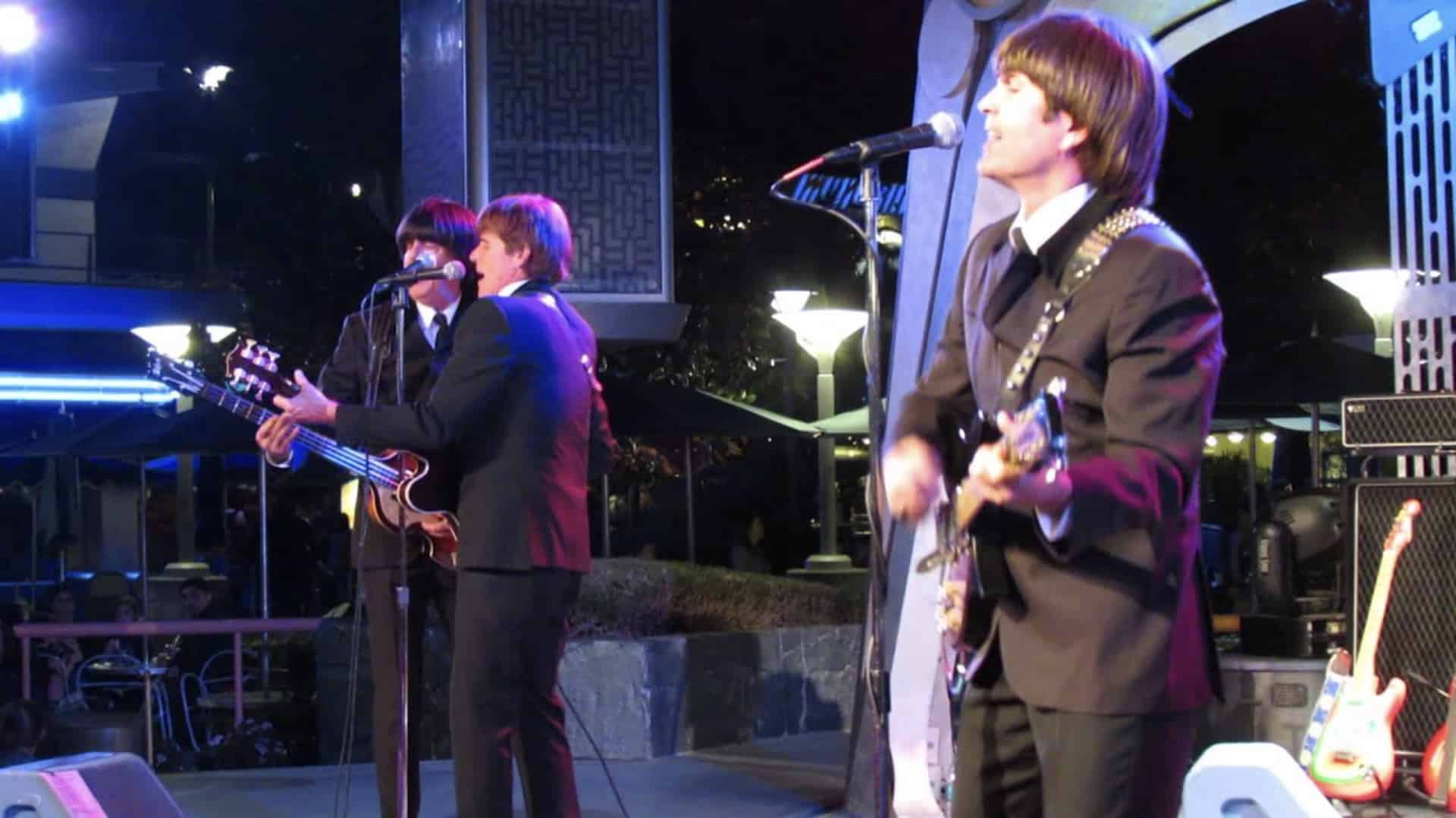 he Beatles tribute band Paperback Writer perform on stage