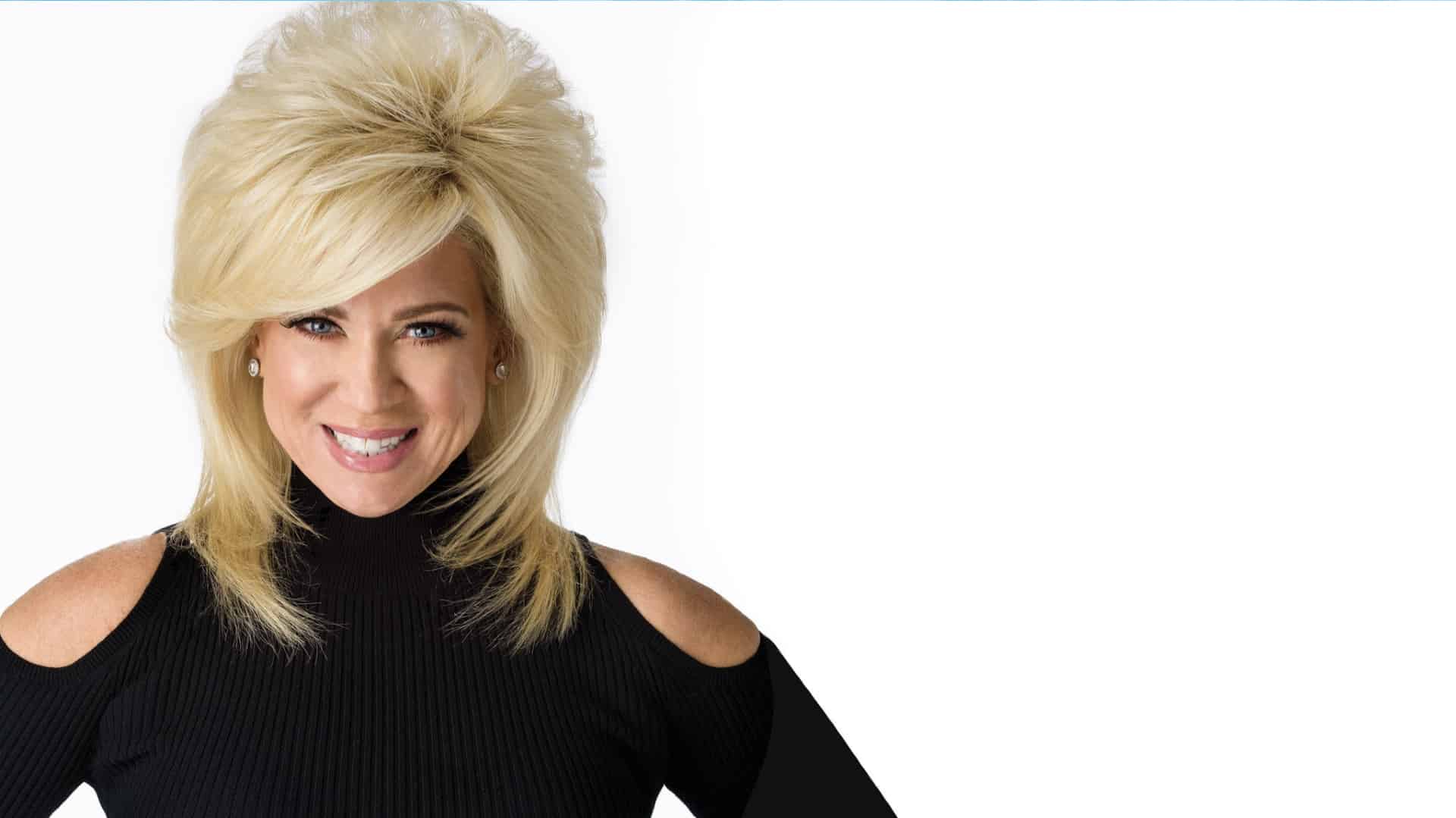 Theresa Caputo smiles