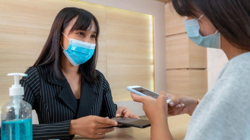 What happens when I check into the hospital or surgery center? a patient checks in at a hospital front desk