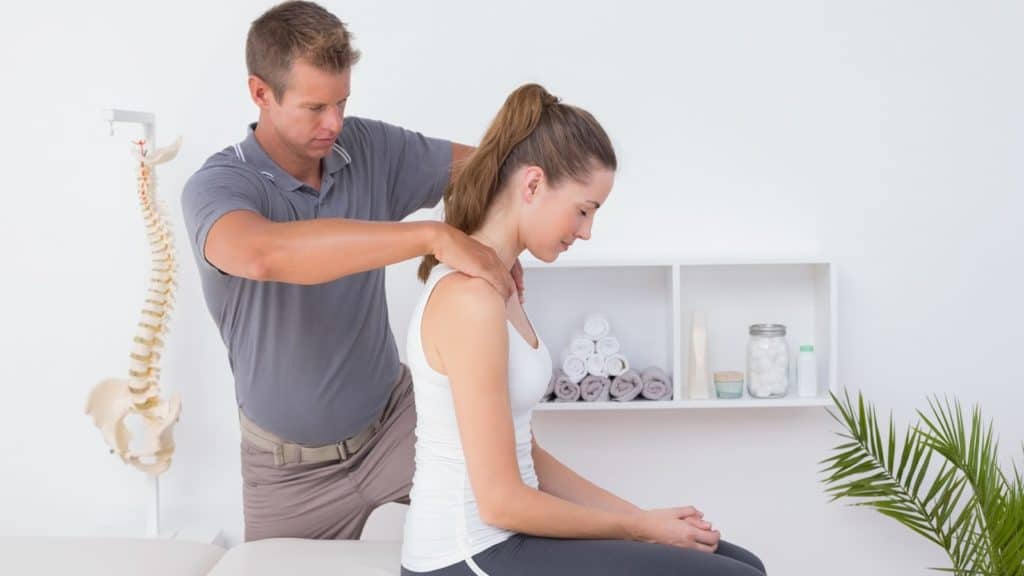 a person undergoes a chiropractic consultation