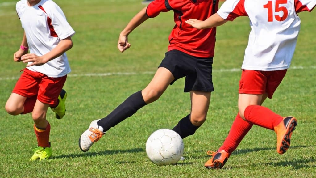 young soccer players in action