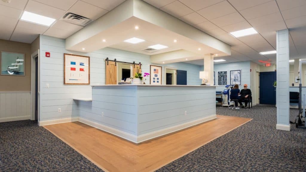 Reception desk at an acupuncture clinic | NorthEast Spine & Sports Medicine