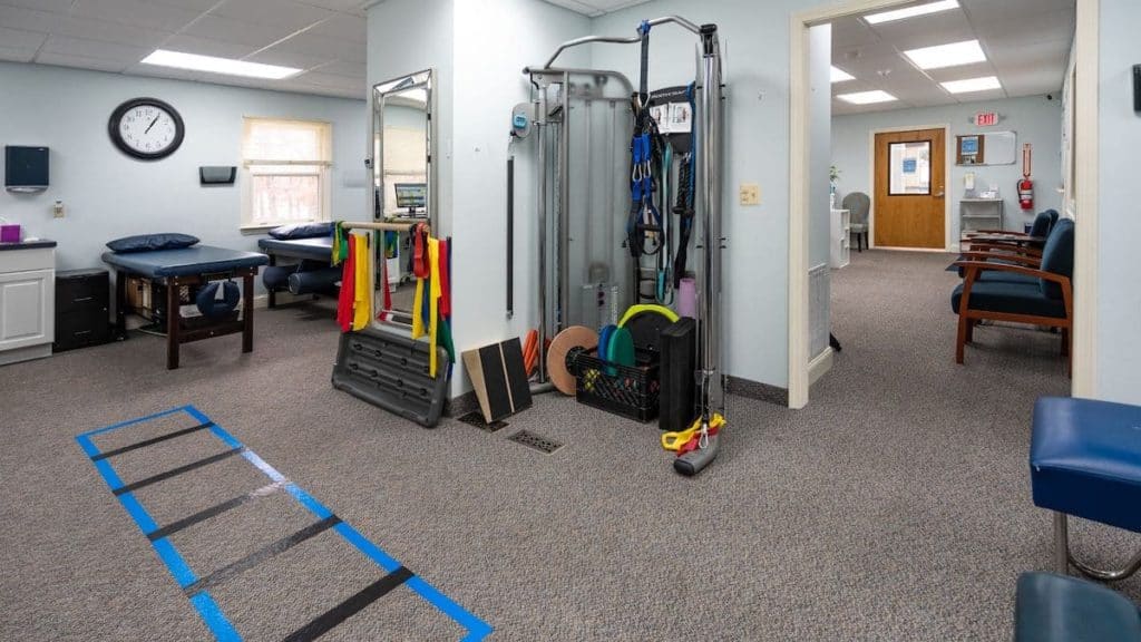 Photo of exercise equipment in an empty physical therapy office | Northeast Spine and Sports Medicine